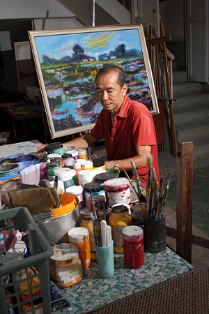 Dr. Edwin Ho in Patron Music & Arts fine art gallery