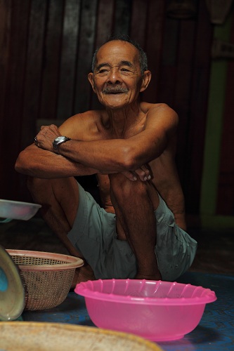 A native in a Bidayuh Salako Longhouse in Kampung Pueh, Sematan, Sarawak