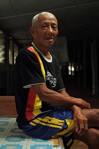 A native in a Bidayuh Salako Longhouse in Kampung Pueh, Sematan, Sarawak