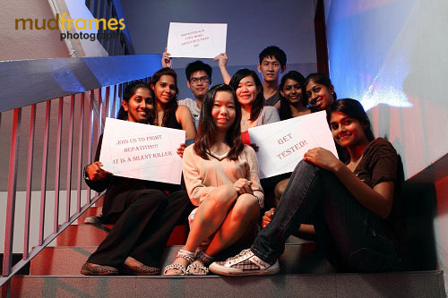 Stamford College's students with World Hepatitis Day 2012 placard message