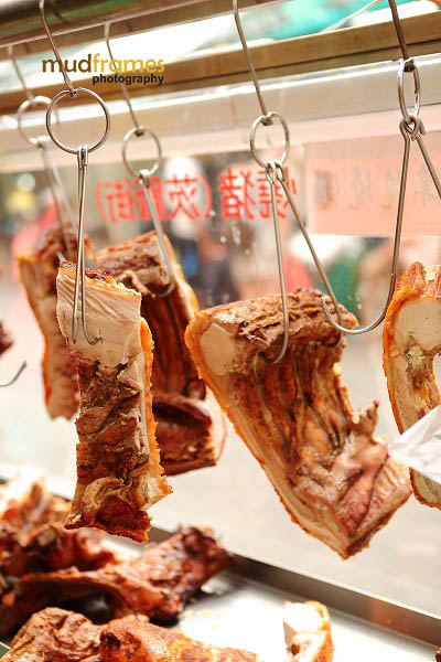 Pork meat hanging for sale at Petaling Street, Kuala Lumpur