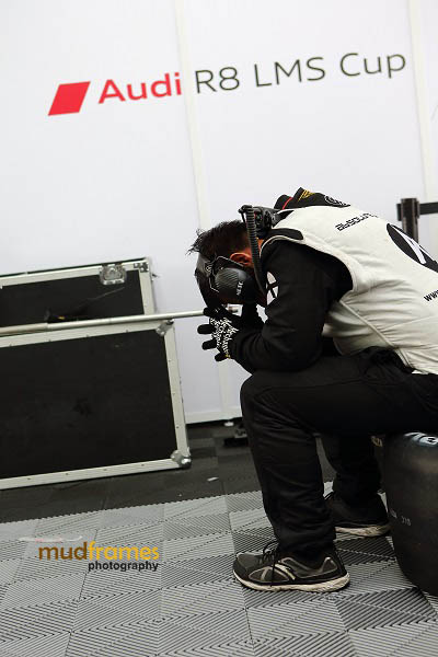 A crashed out Audi race crew getting a shut eye at the pit during MMER 2013 at Sepang