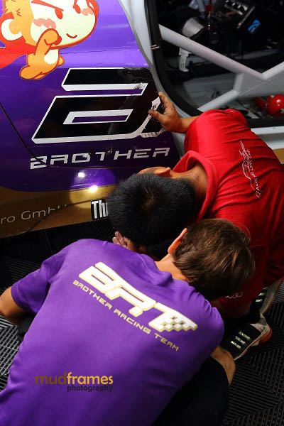 Audi race crew at pit during MMER 2013 at Sepang