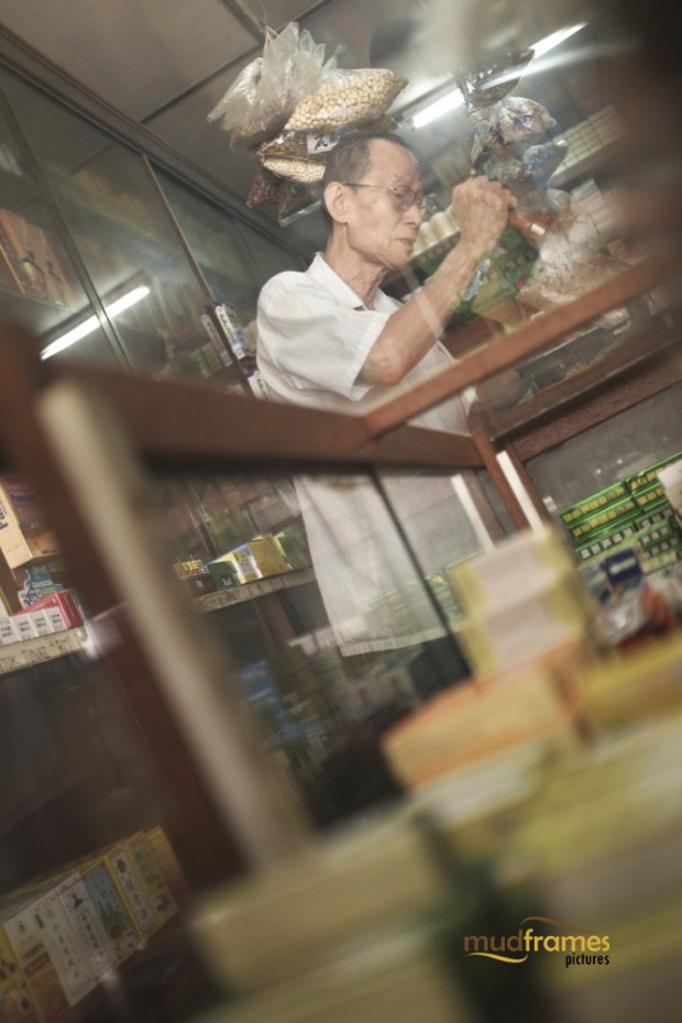 A traditional chinese medicine practitioner at Kok Ann medical store at Kuching, Malaysia