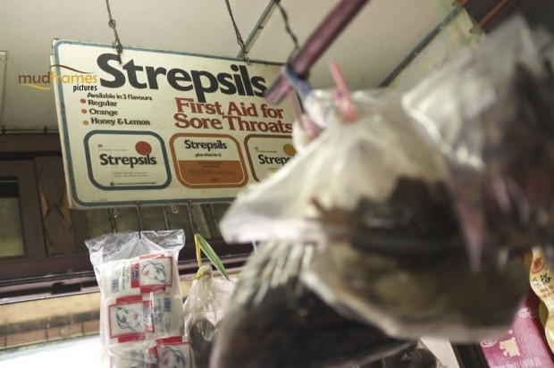 Strepsils advertisement board at Kok Ann medical store, a traditional chinese medicine outlet at Kuching, Malaysia
